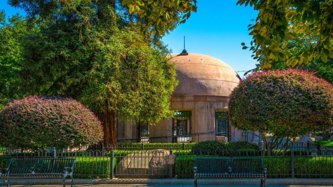 Chico City Plaza Dome and garden view from the street, autumn landscape with manicured evergreen trees, Chico, Northern California
