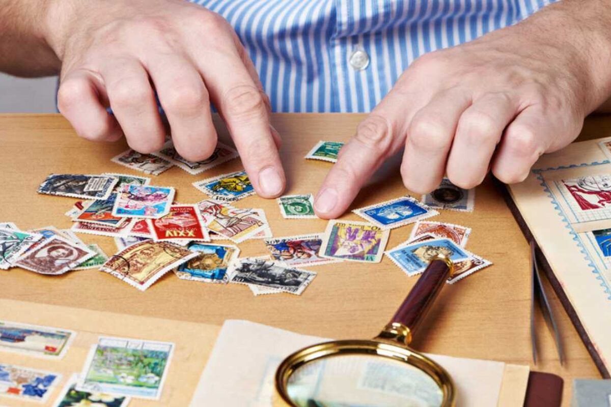 Man collecting stamps