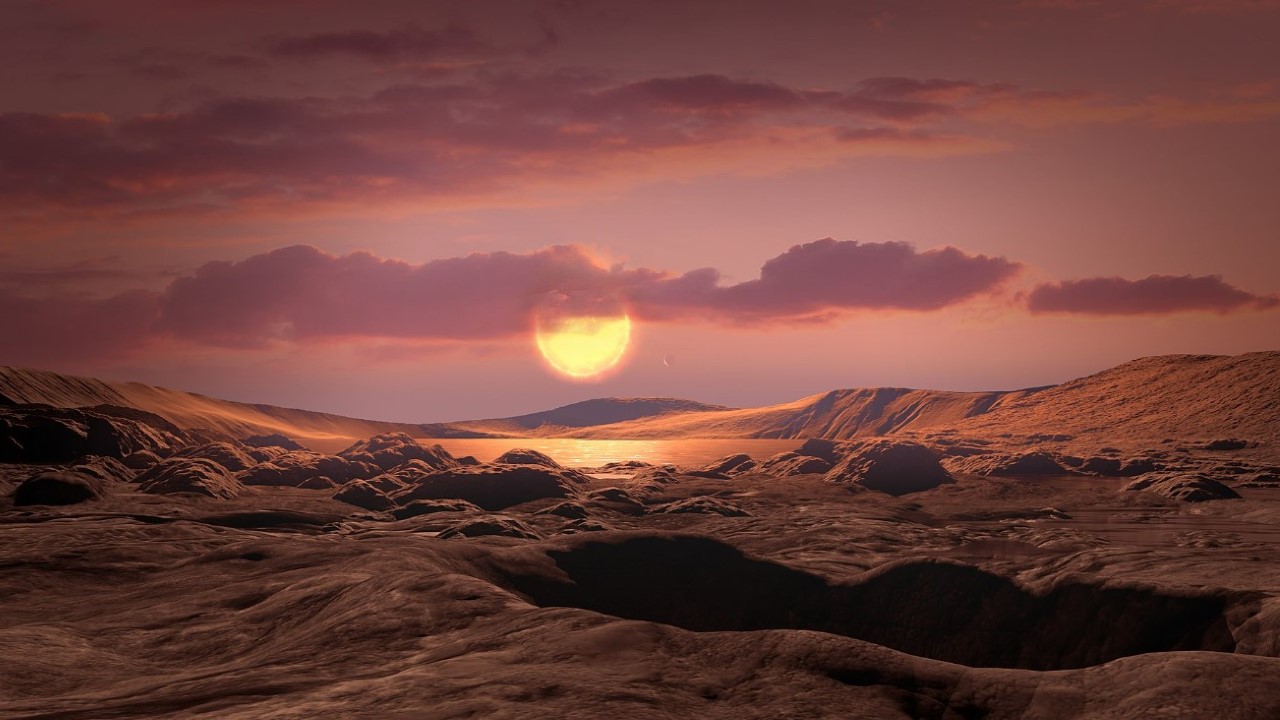 Artist's impression of the surface of Kepler-1649c with host star and Kepler-1649b in the sky