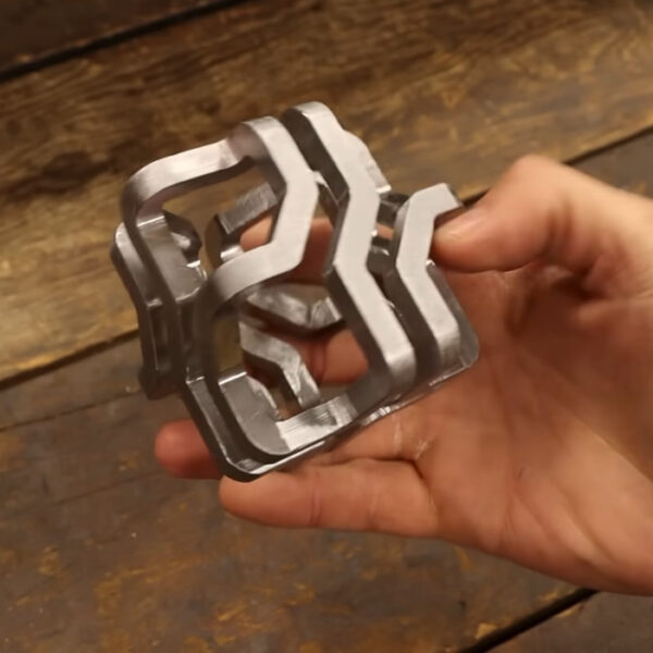 Milling A Solid Block Of Steel Into A Mobius Cube With Only One Side