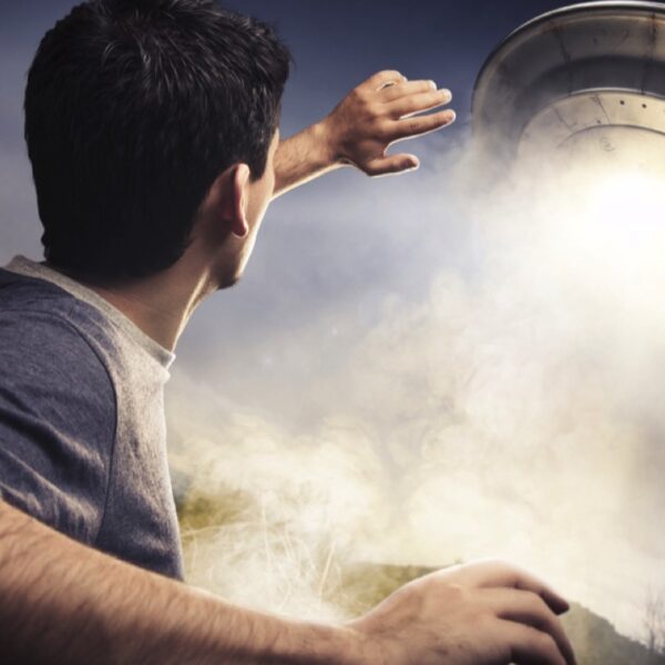 Man-seeing-UFO-plate-landing